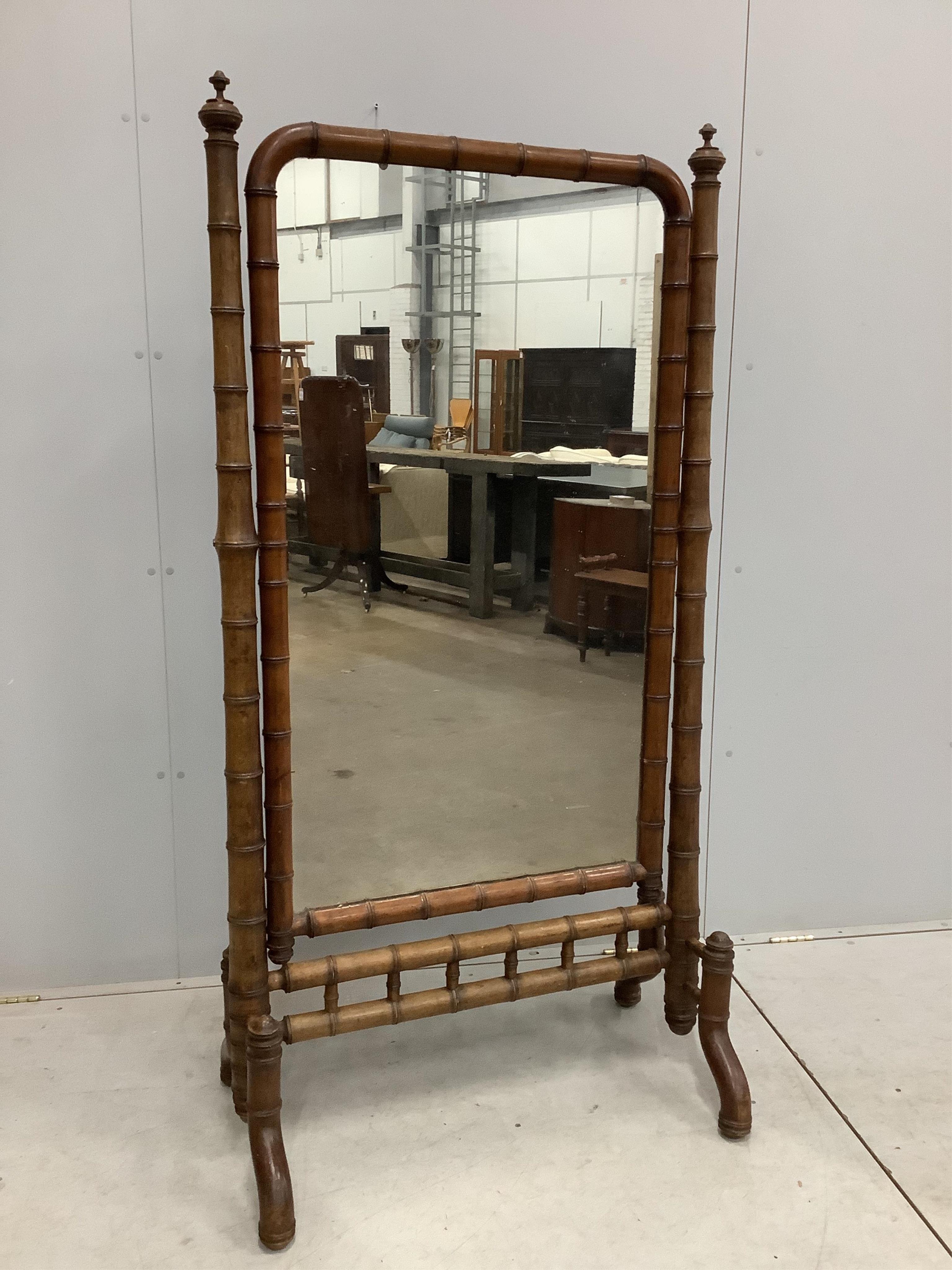 A 19th century French faux bamboo cheval mirror, width 87cm, height 170cm. Condition - fair